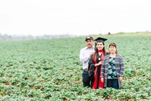 Graduate Honors Parents Who Worked in Strawberry Fields to Support Her