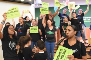 Families and Teachers Shut Down School  Board Meeting to Oppose School Closures
