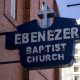 A blue and white sign marks the home of Ebenezer Baptist Church where Martin Luther King Jr. preached in Atlanta.
