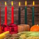 A typical Kwanzaa altar features a mat, fruits and vegetables as well as a kinara, or candleholder and mishumaa saba, the seven candles representing the principles of Kwanzaa that are lit each day from December 26 to January 1. Photo courtesy of iStock.