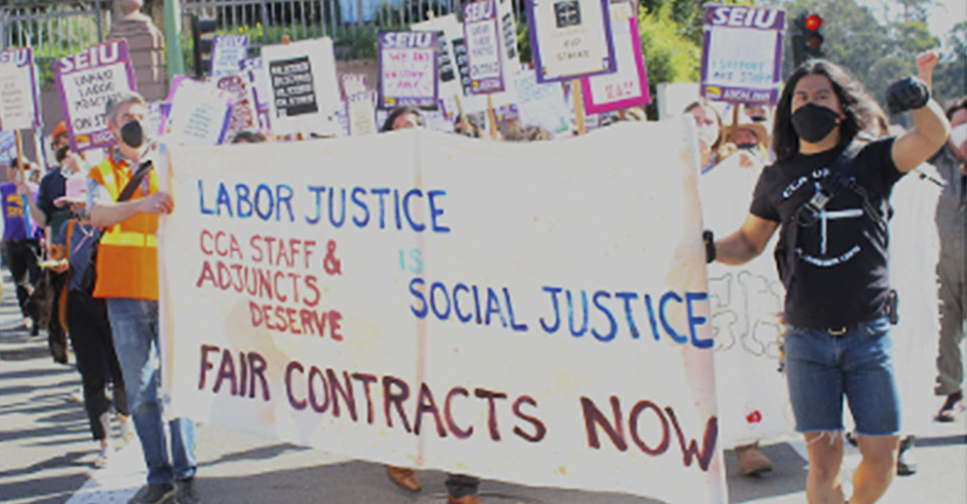 Members of the California College of the Arts staff union march outside of the school's Oakland campus on February 9. Photo by Zack Haber.