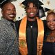 Isaiah Saucer, in cap and gown, is flanked by his father Marvin Saucer, left, and his mother, Altrinice Grant Saucer, right. Photo by Joe L. Fisher.