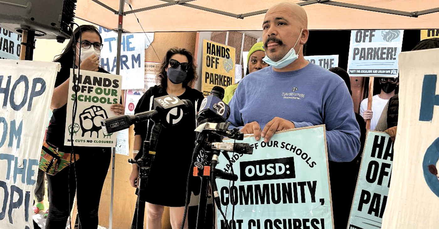 This Wednesday, protesters held a press conference, accusing the district of political repression and retaliation by firing two educators who have been active in the fight against school closures and in defense of Parker school.
