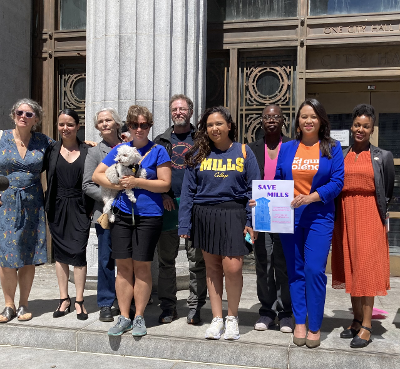 The July 19, 2022 press conference at Oakland City Hall supports the fight to save Mills College and calls for an independent state investigation into the merger with Northeastern University.  