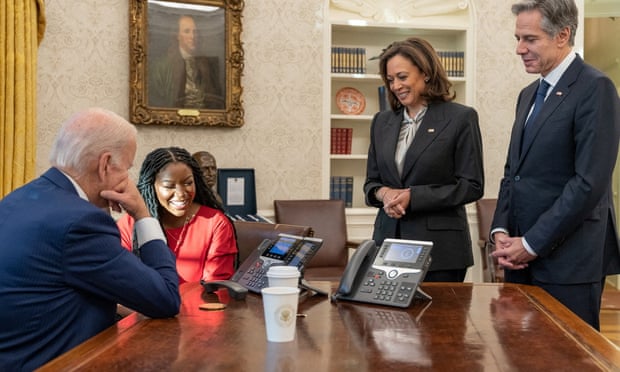Joe Biden and Cherelle Griner speak on the phone with Brittney Griner after her release by Russia, as Vice-President Kamala Harris and the secretary of state, Antony Blinken, look on. Photograph: White House/Reuters