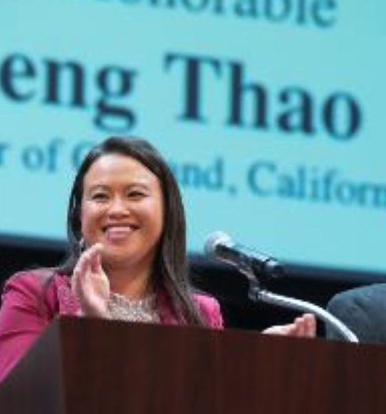 Mayor Sheng Thao, sworn in as the 51st Mayor of Oakland, is flanked by her son Ben Ventura and her father “Richard” Nou My Thao at the Paramount Theatre in Oakland, Jan. 9, 2023. Photo courtesy of Alain McLaughlin Photography.