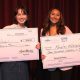 Harper Iles, left, and Kayla Morales each hold the scholarship checks they received for winning in the Poetry Out Loud competition on Feb. 11. Photo courtesy of Contra Costa County Office of Education.