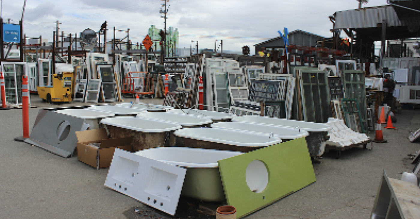 A collection of second hand second hand bathtubs, sinks and windows for sale at Urban Ore, a large popular salvaged goods store in Berkeley. Photo on February 14 by Zack Haber.