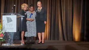 Yvonne Hines: Yvonne’s Southern Sweets owner, Yvonne Hines, center, receives the NCBW Oakland Entrepreneur Award from NCBW Oakland President Frances Cohen, left, and NCBW Oakland Luncheon Chair Shari Woolridge right. Photo By Carla Thomas 