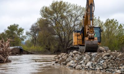 Work is done to repair a levee break near the township of Pajaro in Monterey County, Calif., on March 13, 2023. Waters from the Pajaro River breached the levee around midnight on March 10, 2023. (Ken James/California Department of Water Resources via Bay City News)
