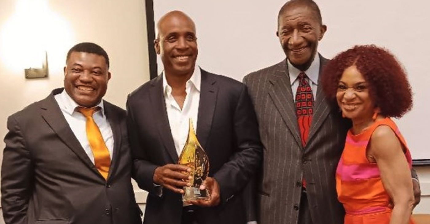 Barry Bonds, baseball legend, second from left, received the Legacy in Branding award from the SFAACC at their 2023Juneteenth celebration. Dr. Matthew Ajiake, president, SFAACC, left, Frederick Jordan, board chairman, SFAACC, and Renel Brooks-Moon, "The Voice of the San Francisco Giants" (right). Photo by Ken Johnson, SFAACC
