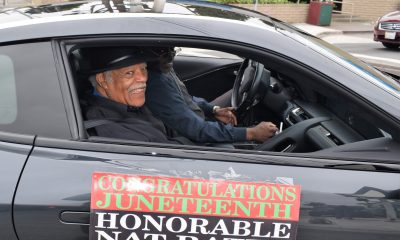 Nat Bates rides along in Richmond’s 2023 Juneteenth parade. Photo by Mike Kinney.