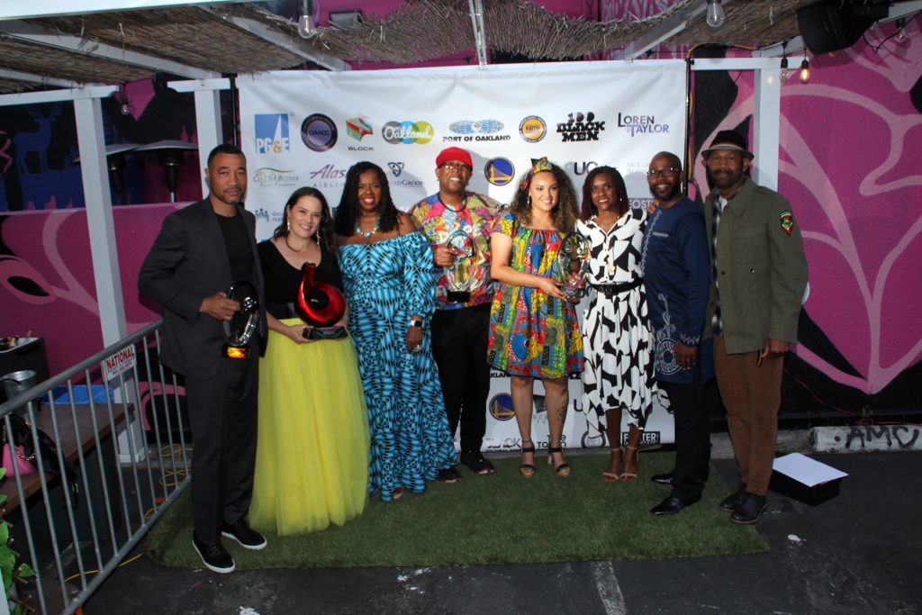 Left to right: Base Ventures Kirby Harris, Kaitlin McGaw, co-founder of the Grammy award-winning Alphabet Rockers; Oakland African American Chamber of Commerce CEO Cathy D. Adams, CDA Consulting Group; Tommy Shepherd, co-founder Grammy award-winner, Alphabet Rockers; East Oakland Youth Development Center CEO Selena Wilson; Lakisha Young, founder and CEO of Oakland Reach; former Oakland City Councilman Loren Taylor and Chef Nigel Jones. Photo by Auintard Henderson.