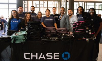 The support team of the backpack giveaway sponsored by the Oakland Branch of the JPMorgan Chase Bank seen with the host, Community Manager and Vice President Myesha Brown, fourth from right. Photo courtesy of Chase Bank.