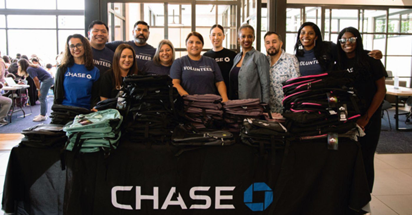 The support team of the backpack giveaway sponsored by the Oakland Branch of the JPMorgan Chase Bank seen with the host, Community Manager and Vice President Myesha Brown, fourth from right. Photo courtesy of Chase Bank.