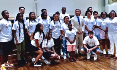 Members of the Performing Stars Social Justice Youth Initiative visits Mayor Steven Reed (in suit and tie), of Montgomery, Ala. Photo by Felecia Gaston.