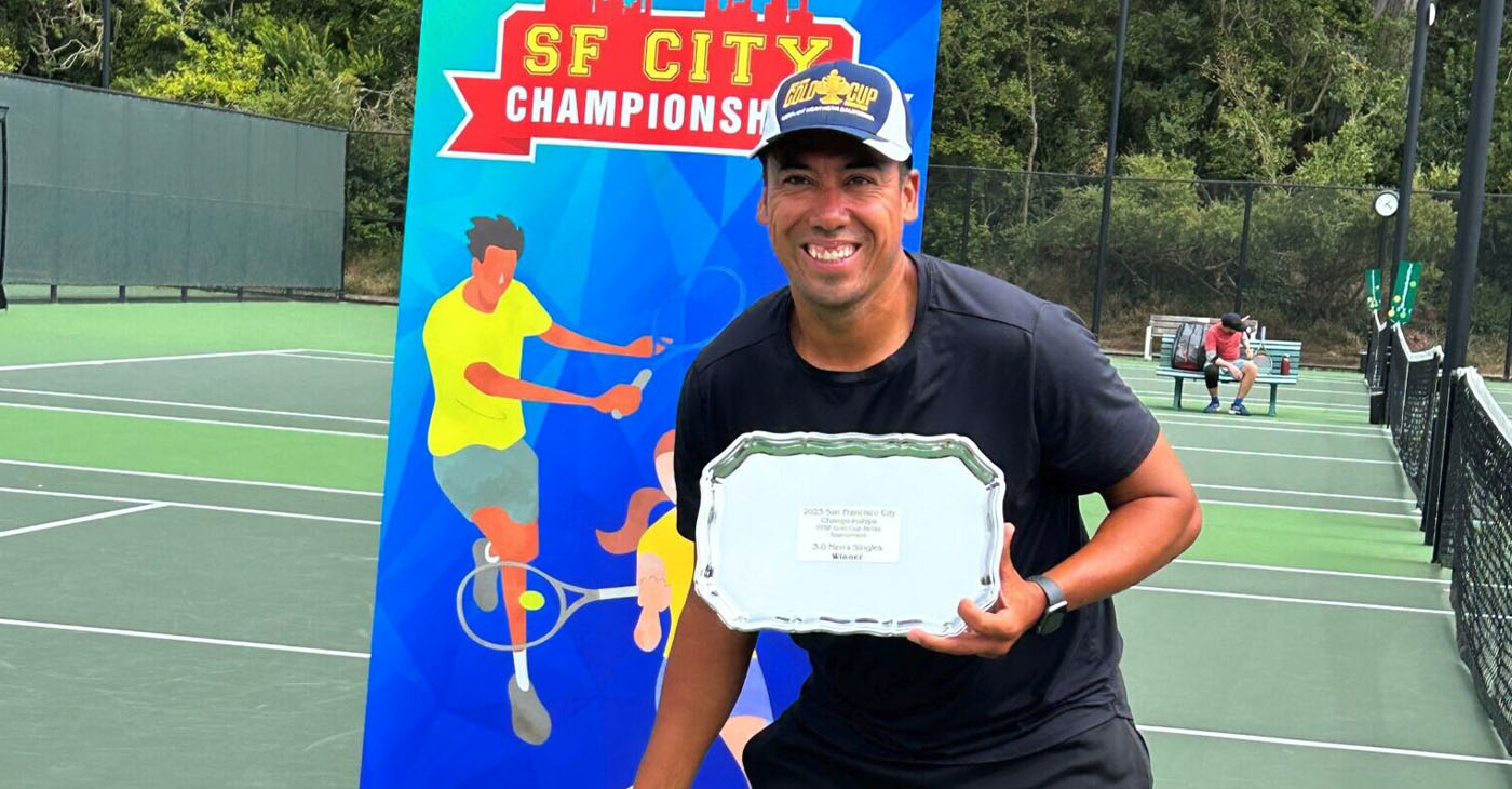 Fernando Ramos, a physical education teacher in Richmond, holds his prize after winning the San Francisco City Championships NTRP Gold Cup series tournament. Photo courtesy The Richmond Standard.