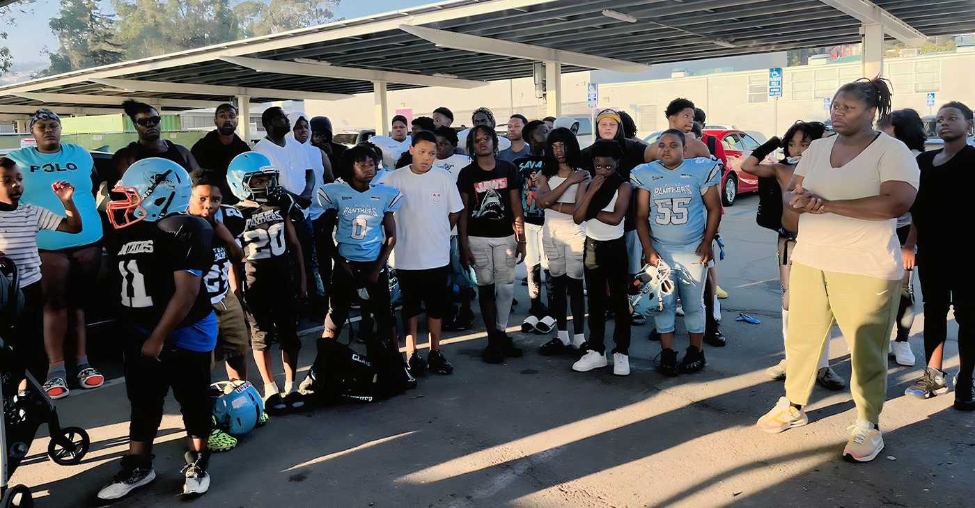 Shortly after a shooting at Verdese Carter Park, the East Bay Dragon community football team, learn that they will not be practicing there anymore because of the danger. Photo by Daryle Allums.