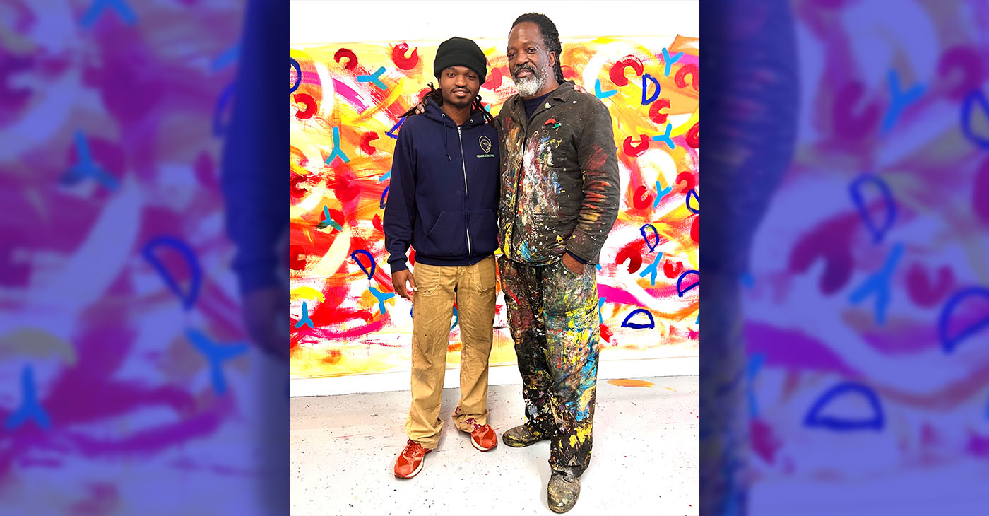Upcoming artist Osaze Seneferu with his father, renowned painter Malik Seneferu. Photo by Linda Parker Pennington.
