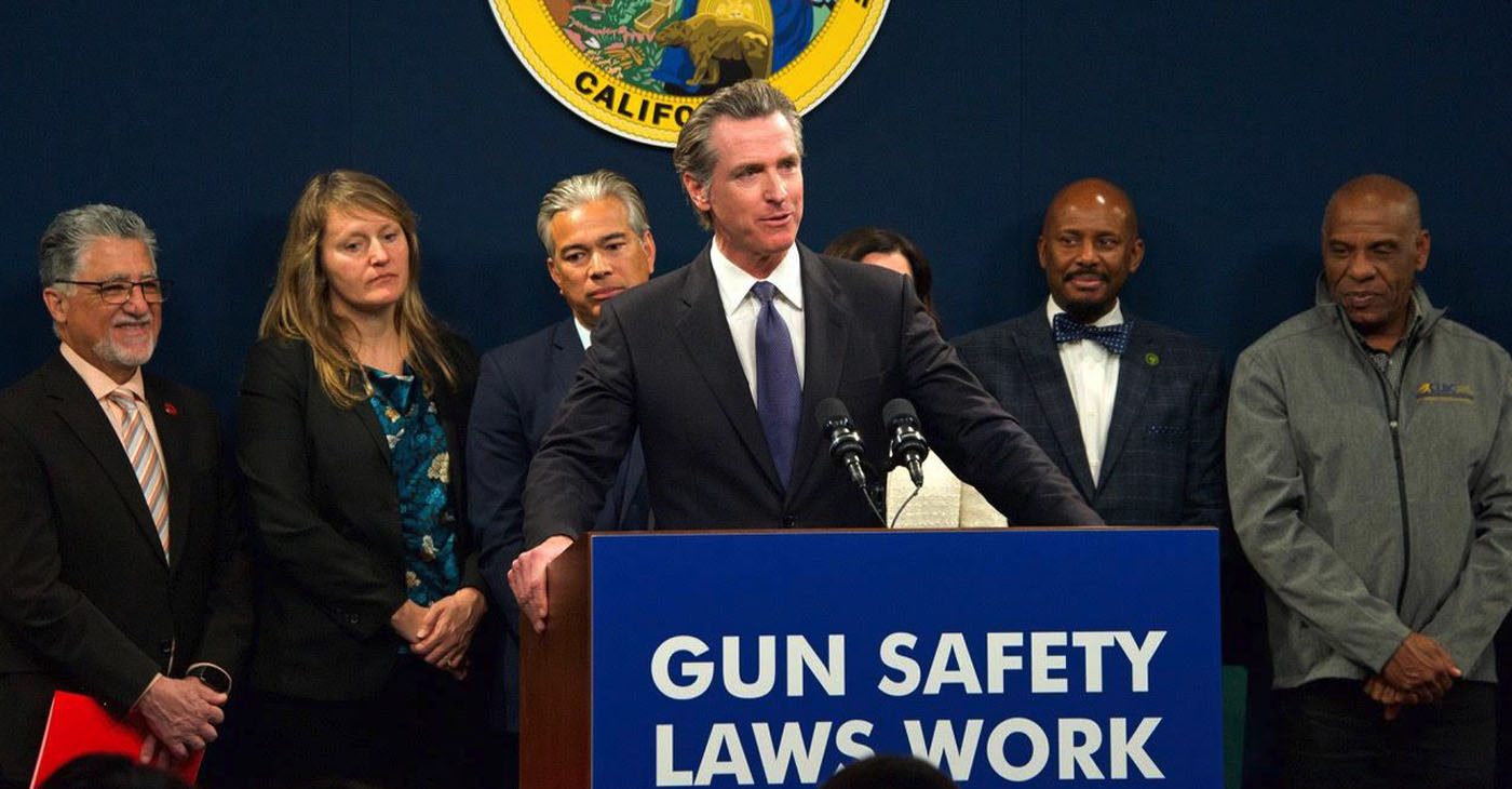 Gov. Gavin Newsom speaking at a gun safety legislation press conference in February. Photo by Sheila Fitzgerald.