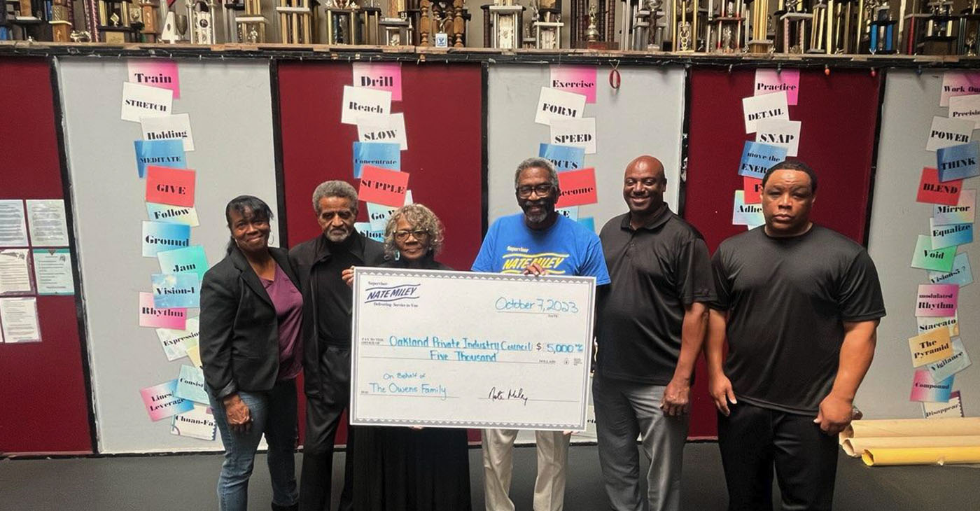 Witnessing the receipt of the donation to the Private Industry Council are from left; Linda Taylor, Sifu Bill and Mary Owens, Nate Miley, Ray Lankford and Shawn Easki Adams.