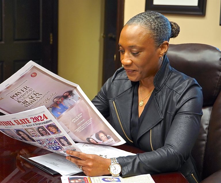 Sen. Butler reads the latest news in the L.A. Sentinel. (E. Mesiyah McGinnis/L.A. Sentinel)