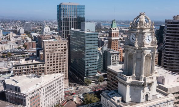 Skyline aerial view of the urban core of downtown Oakland, California. Credit to MattGush, iStock