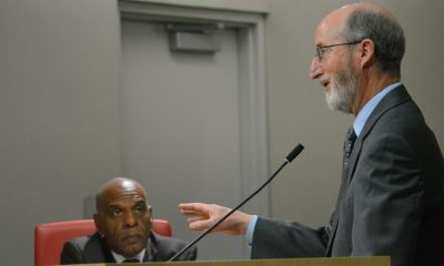Sen. Steven Bradford (D-Inglewood), seated, listens to Sen. Steve Glazer (D-Contra Costa), at the podium, present a bill that would impose fees on major digital technology companies to fund local newsrooms in the state. The Senate Revenue and Taxation Committee voted 4-1 to approve SB 1327 on May 8, 2024. CBM photo by Antonio Ray Harvey.