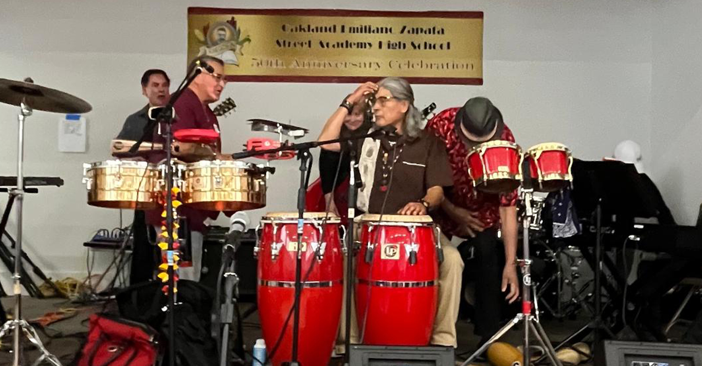 Live music was part of the 50th anniversary celebration of the Emiliano Zapata Street Academy, a public alternative high school, on April 27, at St. Augustine’s Episcopal Church on Telegraph Avenue and 29th Street. Photo by Ken Epstein.