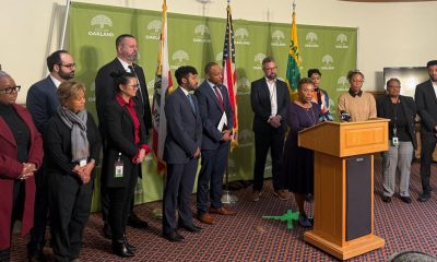 Saying “Oakland is on the move,” Mayor Barbara Lee announces results of Measure U bond sale, Dec. 9, at Oakland City Hall with city councilmembers and city staff among those present. Photo courtesy of the City of Oakland.