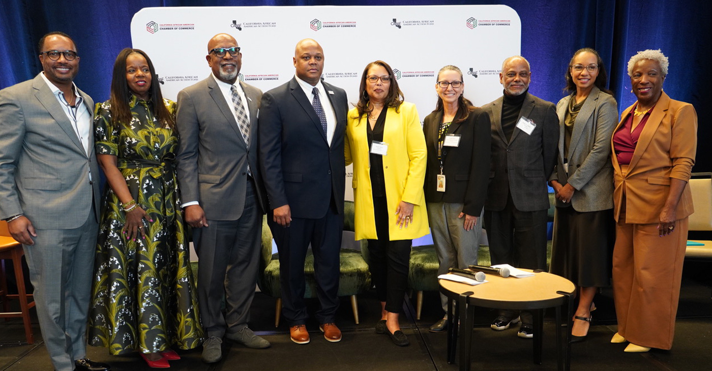 The AI and Business moderator and panelists at CAACC's 2026 Economy Summit. Shown left to right: Vic Baker, Equitify; Cathy Adams, President and CEO of the Oakland African American Chamber of Commerce; Kevin Harbour, BizFed Institute; Ahmad Holmes, CAACC President and CEO; Sarah Harris, Black Business Association; Angela Shell, California Department of General Services; Edwin Lombard, ELM Strategies; Christine Shelby, Digital Strategist, Sacramento Observer; and Patricia Watts, CAACC Chairperson. CBM photo by Antonio Ray Harvey.