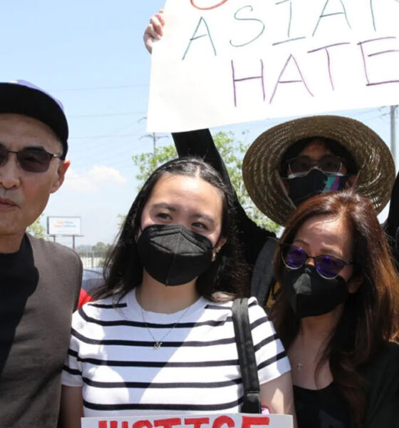 Patricia Roque (far right) pictured with her family at a Stop Asian Hate rally after her father's assault (far left). (Courtesy of AAPI Equity Alliance)