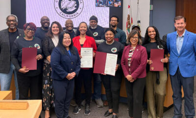 The Reparations Commission members and Alameda County Board of Supervisors celebrated the approval of its report on June 30. Present were (first row, l. to r.) Dee Johnson, Supervisor Elisa Marquez, Supervisor Lena Tam, Debra Gore, Artavia Berry, Supervisor Nikki Fortunato Bas, Jennifer Gayden, and Supervisor David Haubert; Second row (l. to r.) Supervisor Nate Miley, Larry McClendon, Brandon T. Sass, Phil Gardiner, Shadrick A. Small, and James Knowles. Photo by Ashley Sturgis, Supervisor’s Assistant from the Office of Supervisor Lena Tam.