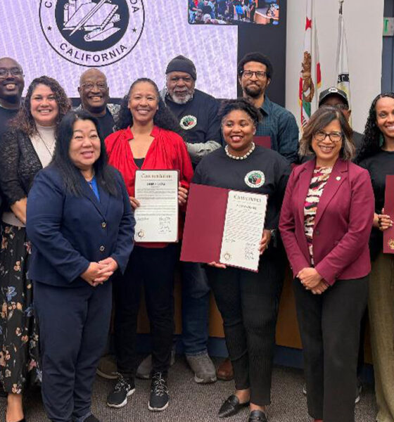 The Reparations Commission members and Alameda County Board of Supervisors celebrated the approval of its report on June 30. Present were (first row, l. to r.) Dee Johnson, Supervisor Elisa Marquez, Supervisor Lena Tam, Debra Gore, Artavia Berry, Supervisor Nikki Fortunato Bas, Jennifer Gayden, and Supervisor David Haubert; Second row (l. to r.) Supervisor Nate Miley, Larry McClendon, Brandon T. Sass, Phil Gardiner, Shadrick A. Small, and James Knowles. Photo by Ashley Sturgis, Supervisor’s Assistant from the Office of Supervisor Lena Tam.