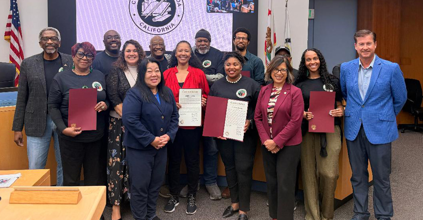 The Reparations Commission members and Alameda County Board of Supervisors celebrated the approval of its report on June 30. Present were (first row, l. to r.) Dee Johnson, Supervisor Elisa Marquez, Supervisor Lena Tam, Debra Gore, Artavia Berry, Supervisor Nikki Fortunato Bas, Jennifer Gayden, and Supervisor David Haubert; Second row (l. to r.) Supervisor Nate Miley, Larry McClendon, Brandon T. Sass, Phil Gardiner, Shadrick A. Small, and James Knowles. Photo by Ashley Sturgis, Supervisor’s Assistant from the Office of Supervisor Lena Tam.