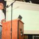 Port Commissioner and Maritime Attorney Derrick Muhammad delivers a speech at Youth Uprising in East Oakland on Saturday, July 25. Photo by Graig Brooks.