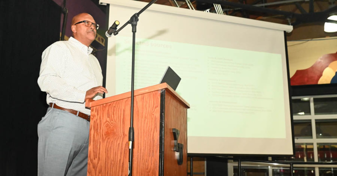 Port Commissioner and Maritime Attorney Derrick Muhammad delivers a speech at Youth Uprising in East Oakland on Saturday, July 25. Photo by Graig Brooks.
