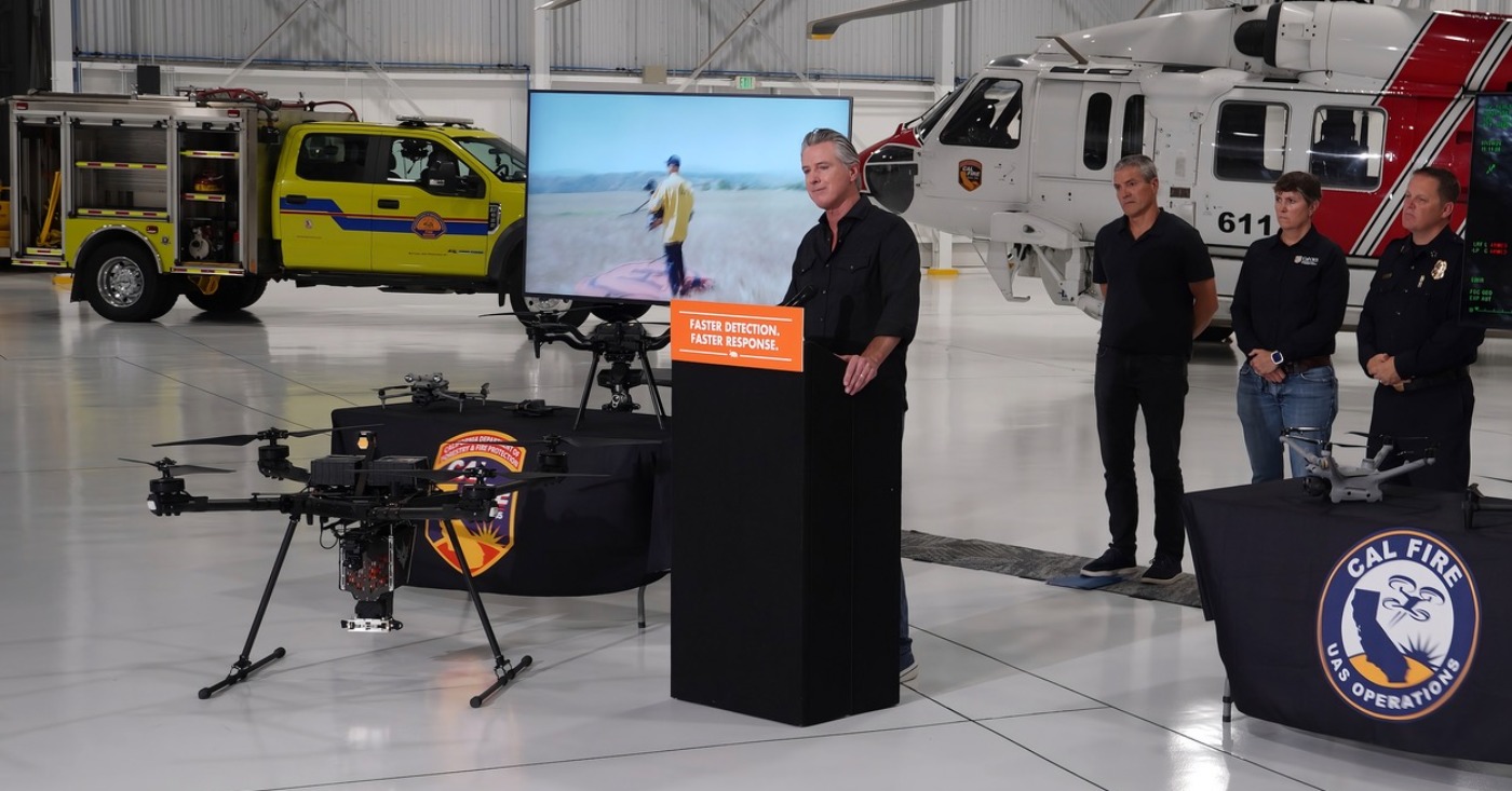 Gov. Gavin Newsom speaks during a July 21 presentation at McClellan Park highlighting California’s investments in advanced firefighting technology and wildfire prevention tools. CBM photo by Antonio Ray Harvey.