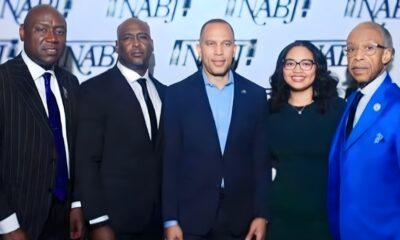 Civil Rights Attorney Ben Crump (left), House Majority Leader Hakeem Jeffries (middle), Rev. Al Sharpton (right) stand at the NABJ conference in Atlanta on Aug. 13 with Elmore and Christine Wonsley, the parents of Nolan Wells, a Black 18-year-old who died July 4th weekend in Mississippi
