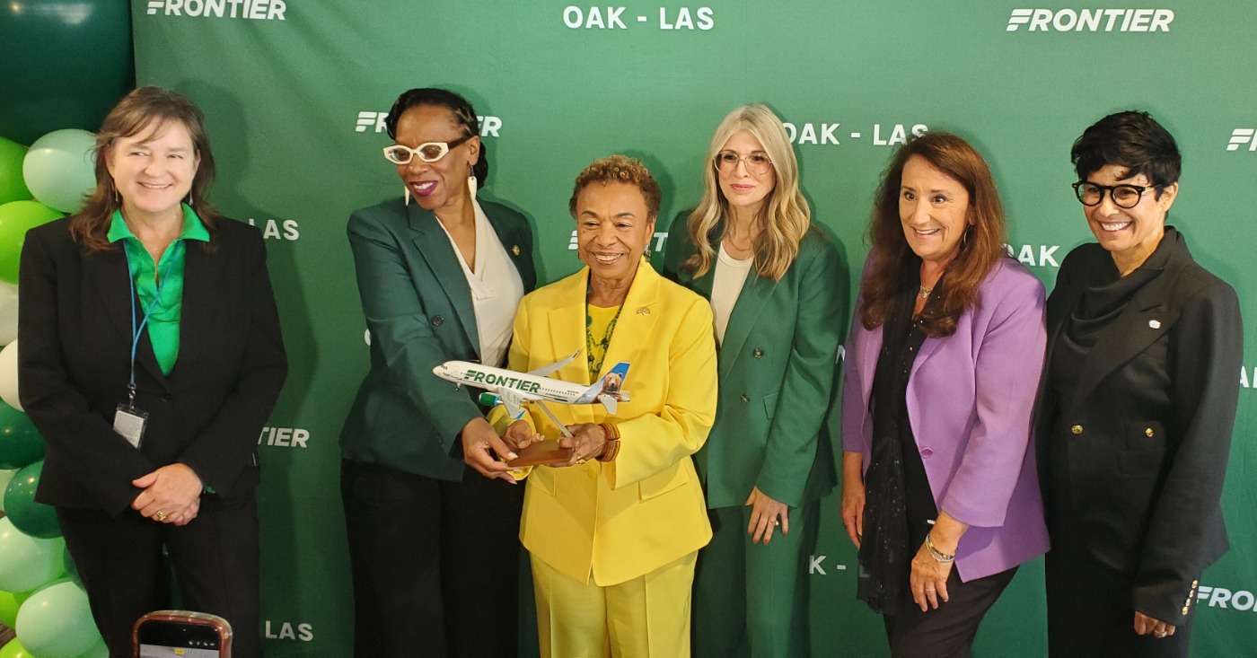 Ribbon cutting ceremony and celebration at Terminal 1, Gate 3 of Frontier Airlines at Oakland San Francisco Bay Airport. (L-R) Port of Oakland Executive Director Kristi McKenney, U.S. Representative Congresswoman Lateefah Simon (D-CA-12), Oakland Mayor Barbara Lee, Frontier Airlines Vice President of Public and Consumer Affairs Tyri Squyres, Oakland Metropolitan Chamber of Commerce president Barbara Leslie, and Port of Oakland Board President Stephanie Dominguez Walton. Photo by Carla Thomas