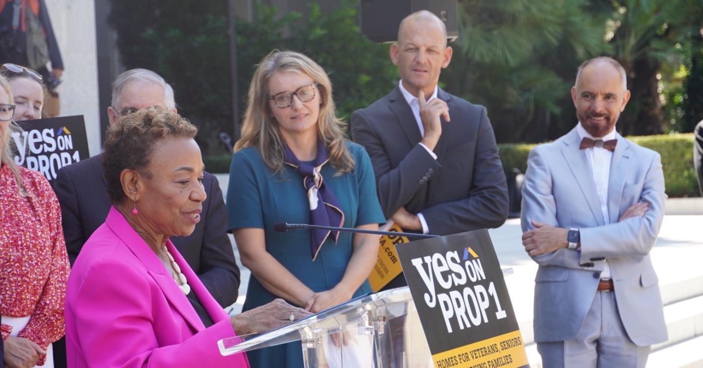 Local and state officials gathered at the State Capitol on Aug. 18 to discuss Proposition 1, a statewide bond measure that would fund housing and homelessness programs. Oakland Mayor Barbara Lee urged voters to approve the measure on the November ballot. Pictured to Lee’s right are Assemblymember Buffy Wicks (D-Oakland), Sacramento Mayor Kevin McCarty and Sen. Christopher Cabaldon (D-West Sacramento). CBM photo by Antonio Ray Harvey.