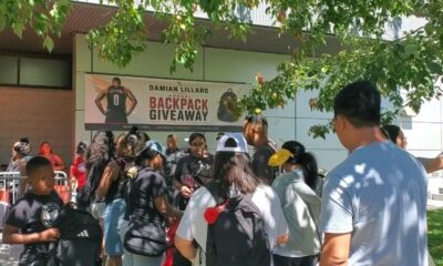 Portland Trail Blazers point guard and Oakland High School alum Damian Lillard hosts back-to-school giveaway at Ira Jinkins Recreation Center in East Oakland. Photo by Carla Thomas.
