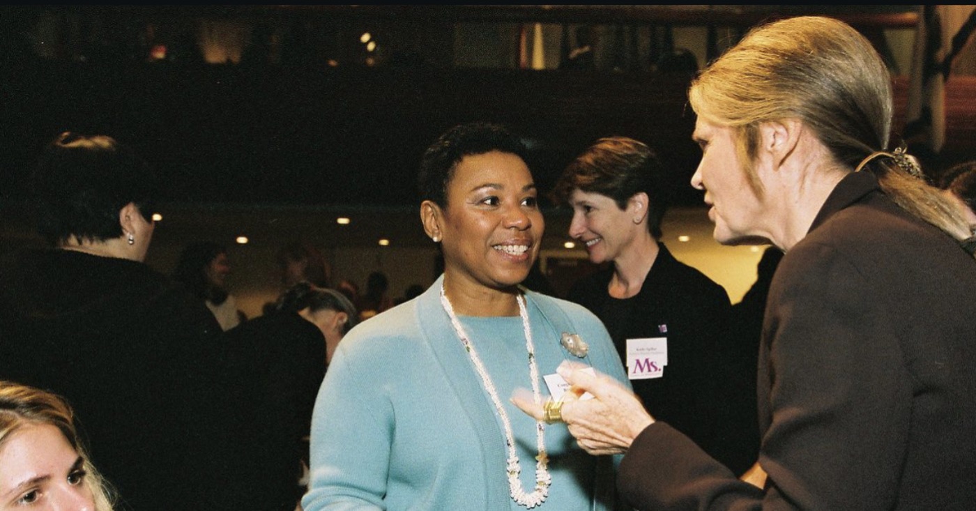 Barbara Lee greets longtime friend Gloria Steinem in undated photo. Facebook image.