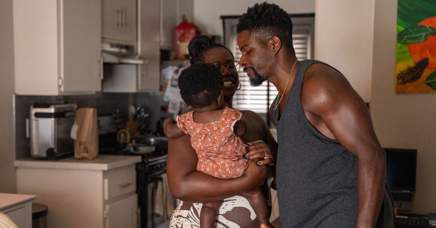 Long Beach resident Cassandra Carter approached the birth of her daughter, Nyomi (pictured), last November with anxiety after losing twins. She is pictured here with her husband.