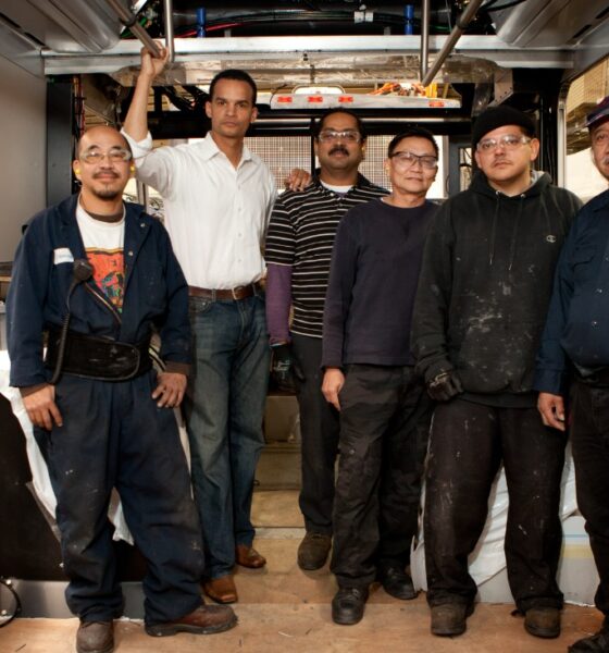 Joel Young with bus union workers. Courtesy photo.