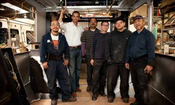 Joel Young with bus union workers. Courtesy photo.