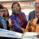 Oakland Mayor Barbara Lee cuts the ribbon at the official opening of Trader Vic’s Outpost and Plum Market at Oakland International Airport. She is assisted by U.S. Rep. Lateefah Simon as Port of Oakland Board President Stephanie Dominguez Walton, left, and representatives from Trader Vic's, Plum Market, look on. Photo courtesy of the mayor’s office.