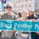 A portion of Broadway from 14th to 17th street was renamed Black Panther Party Boulevard as part of the 60th anniversary of the party’s founding, which was Oct. 15, 1966. Present were (from left) Fredrika Newton, former U.S. Rep. Bobby Rush (the only BPP member elected to Congress); Oakland Mayor Barbara Lee, and District 3 City Councilmember Carroll Fife. Newton, widow of BPP co-founder Huey P. Newton, co-founded the foundation that bears his name as well as the Black Panther Party Museum that is now on BPP Boulevard. Earlier this year, a street was named for BPP co-founder Bobby Seale at 57th and Martin Luther King Jr. Way. Courtesy photo.